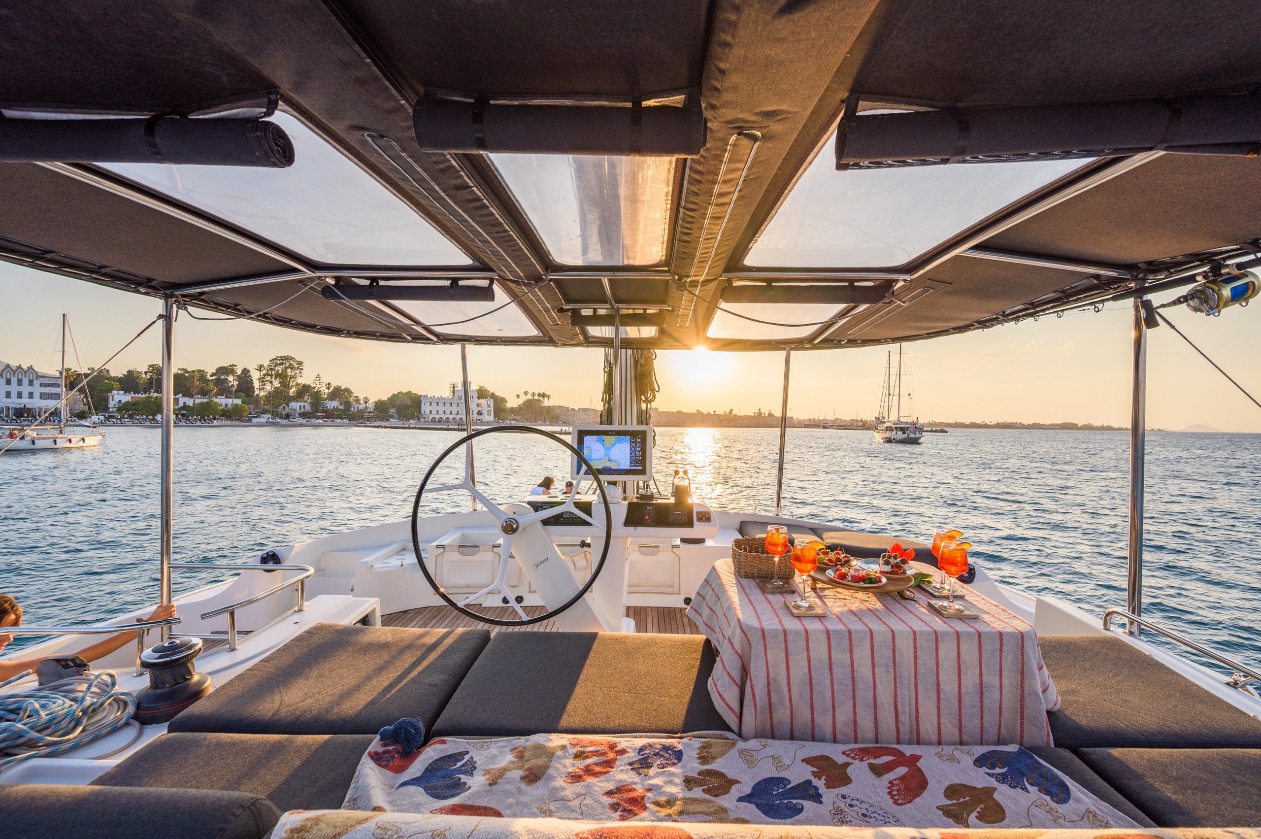 Lagoon 52F flybridge sunset Kos harbour – Stay Salty Sailing, private crewed catamaran charter Lagoon 52F flybridge sunset Kos harbour – Stay Salty Sailing, private crewed catamaran charter