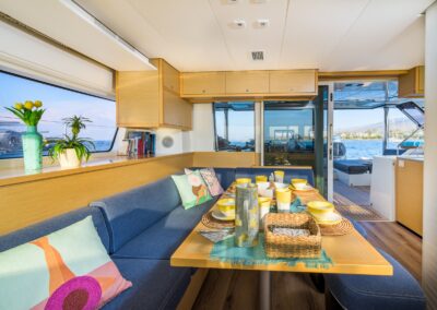 Lagoon 52F saloon dining table breakfast – Stay Salty Sailing, private crewed catamaran charter