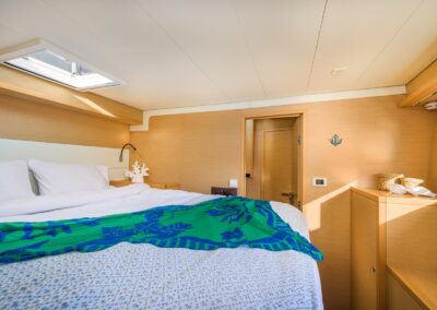 Lagoon 52F guest cabin double bed hatch – Stay Salty Sailing, private crewed catamaran charter
